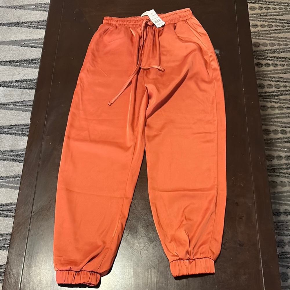 Vibrant Copper Track Pants with Elasticated Ankles and Drawstring Waist
